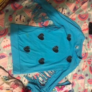 Blue long sleeve shirt with black hearts